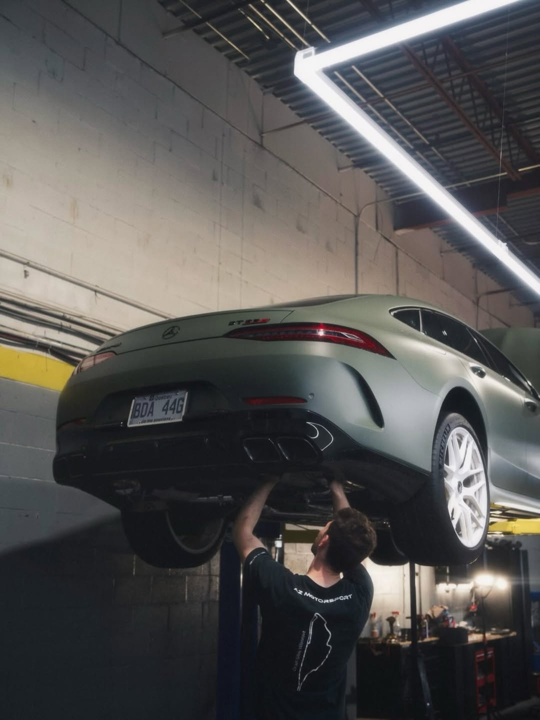 Matte green Mercedes-AMG GT 63 S on the lift