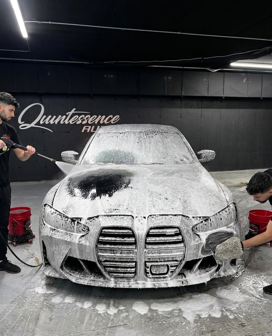 BMW M3 foam wash, two technicians